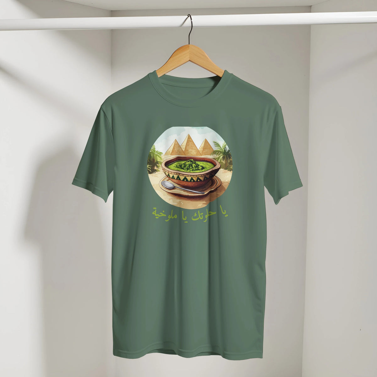 Molokhia Pyramids & Palm Trees Arabic Tee in Military Green, Arabic graphic design by Cairo NYC