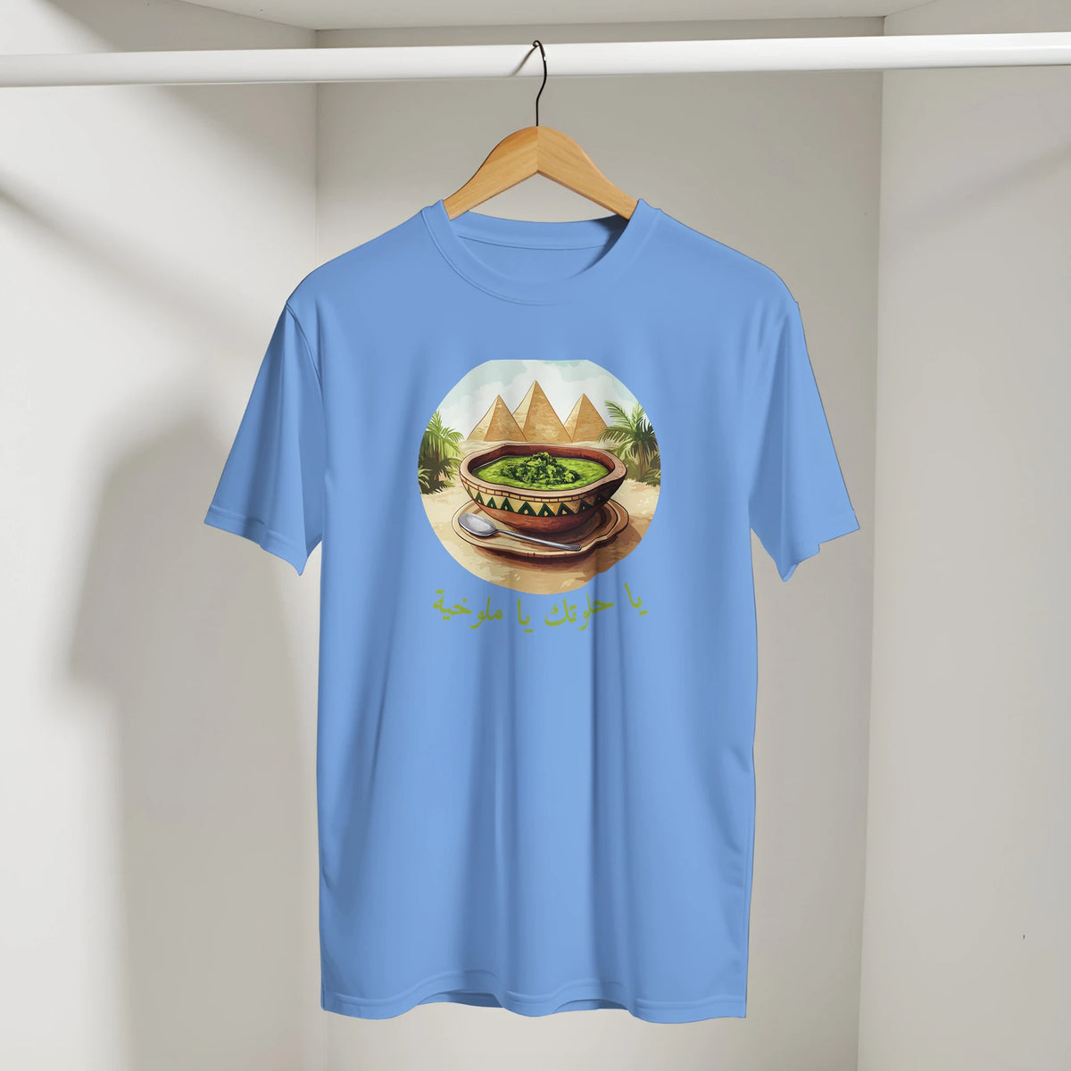 Molokhia Pyramids & Palm Trees Arabic Tee in Carolina Blue, Arabic graphic design by Cairo NYC