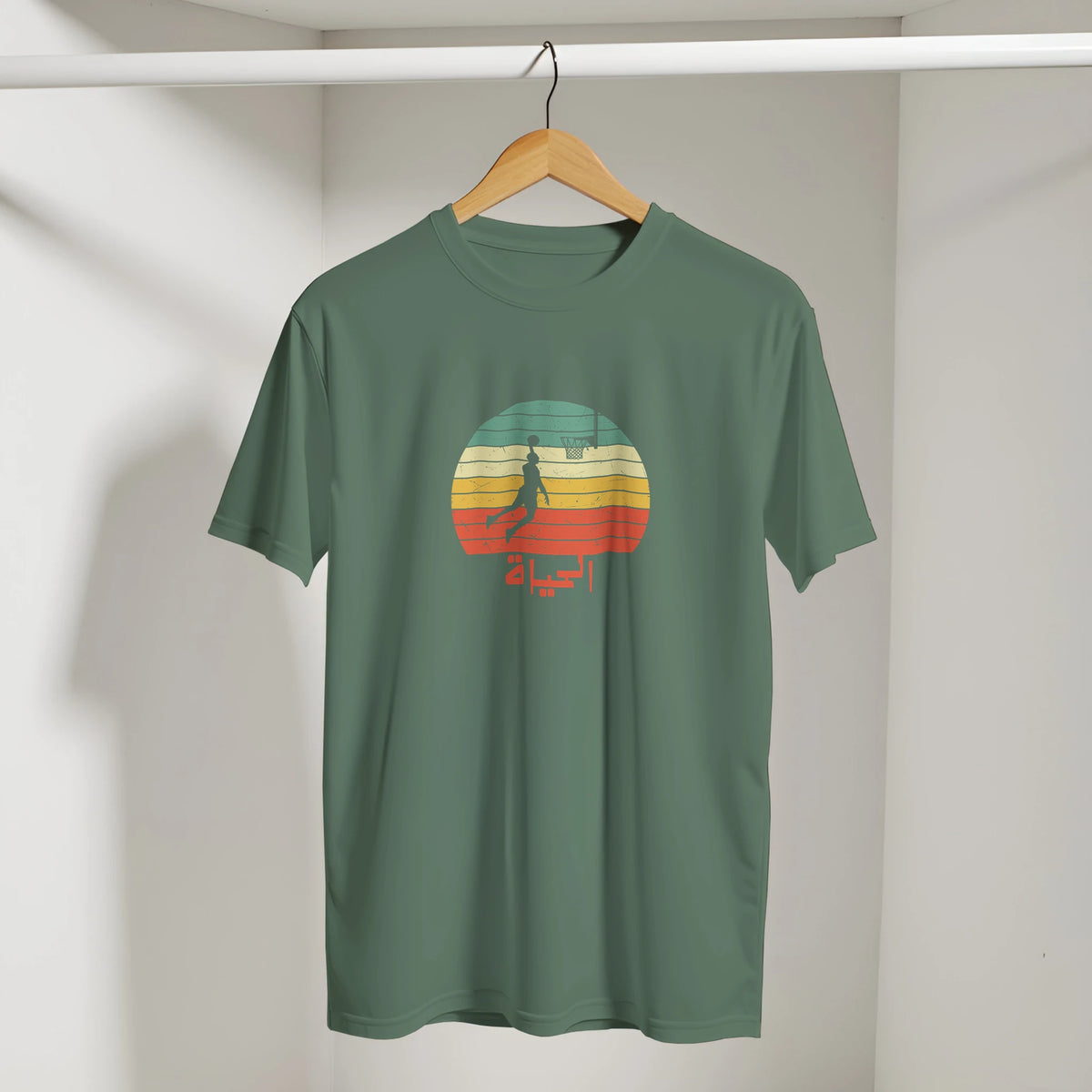 Eshta Retro Sunset Basketball Tee in Military Green, Arabic graphic design by Cairo NYC
